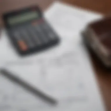 A calculator and financial documents reflecting loan terms and conditions